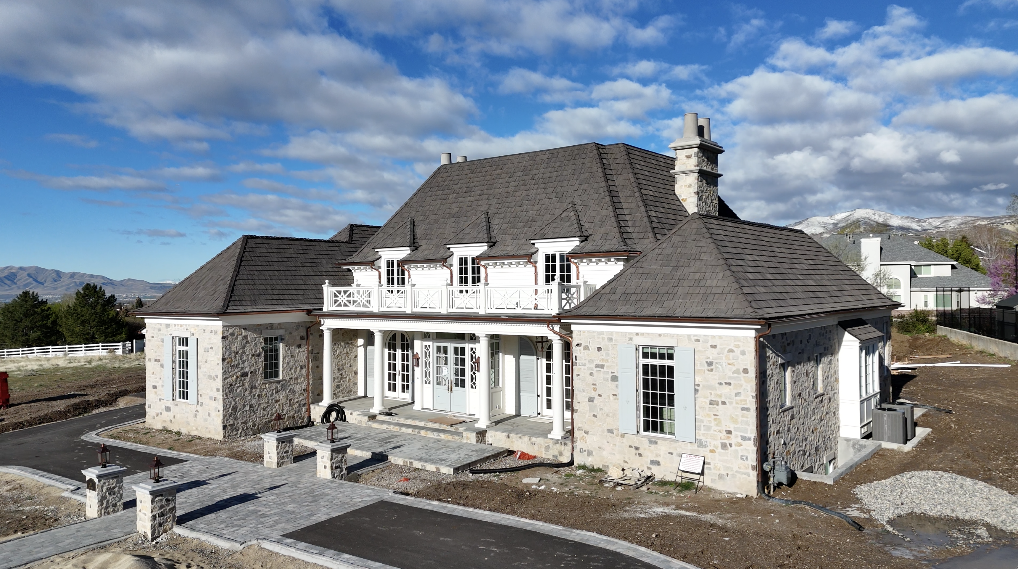 Drone aerial view of Grove Homes custom luxury property in Alpine, Utah